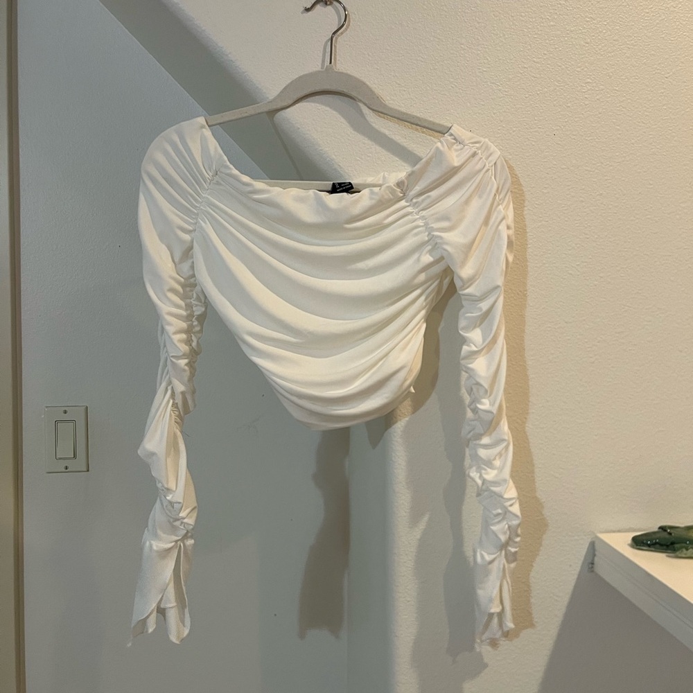 Strapless, long sleeve crop top